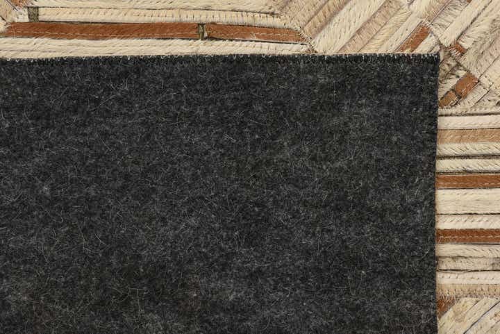 5' 1 x 7' 1 Cowhide Rug
