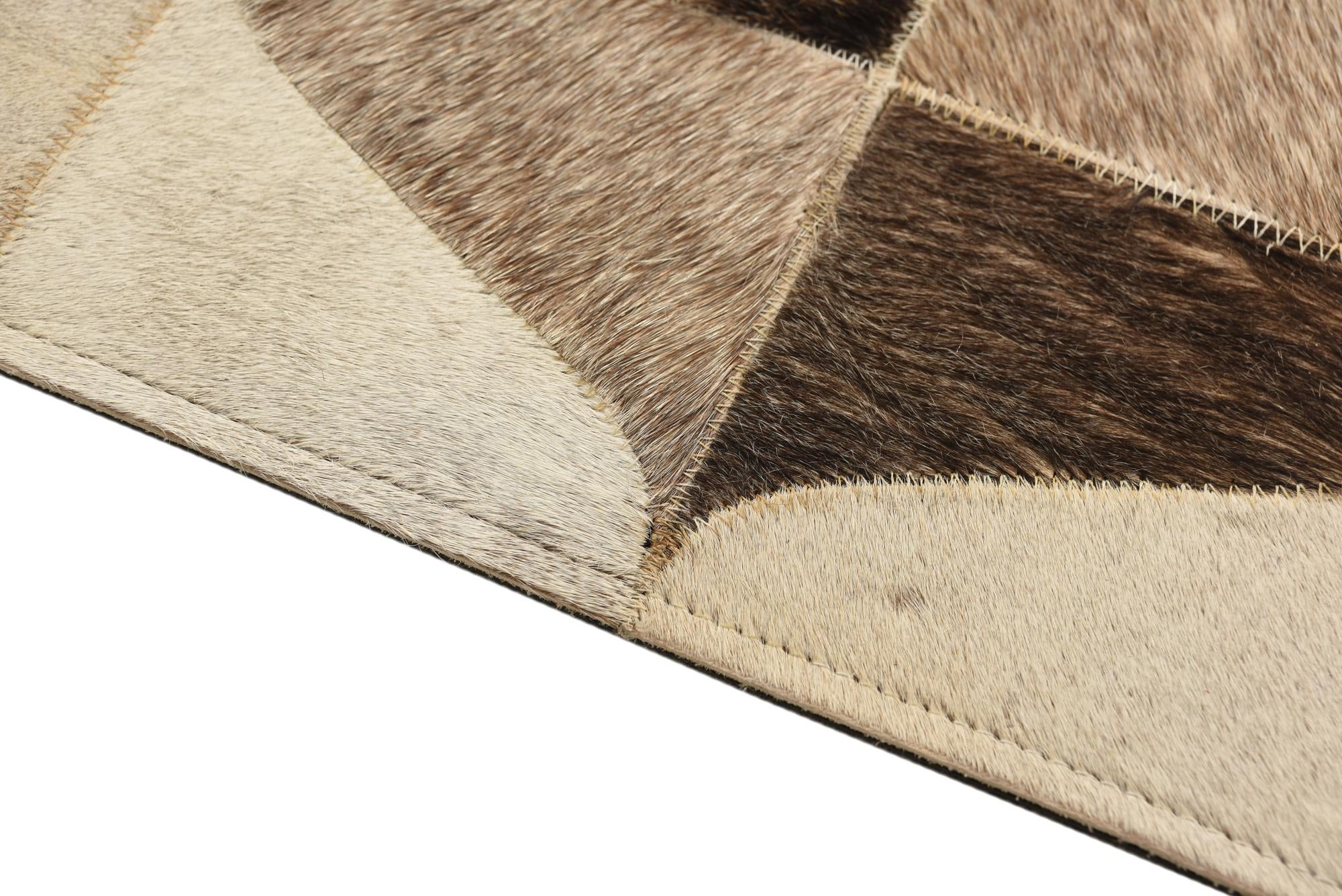 5' 2 x 7' 10 Cowhide Rug