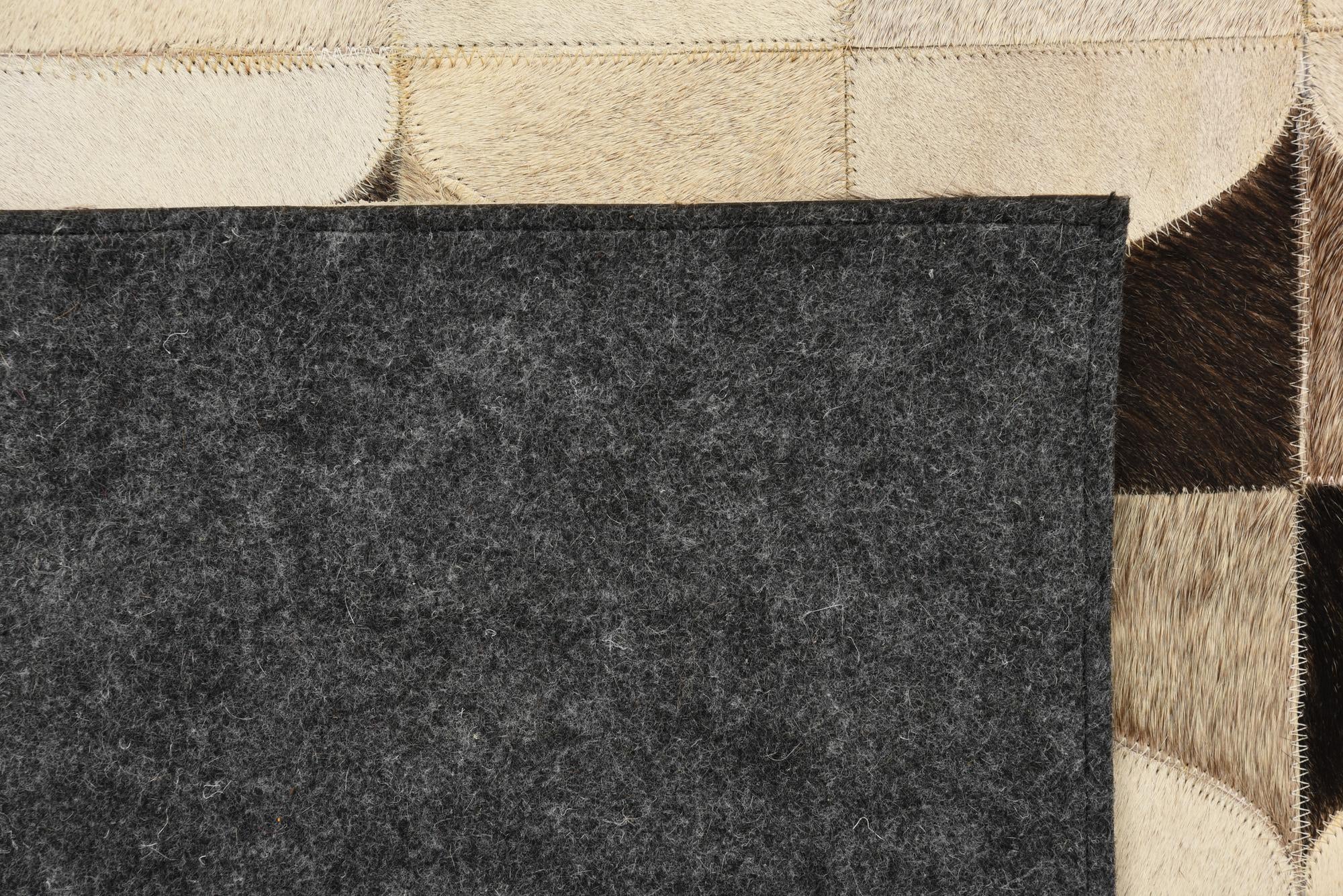 5' 2 x 7' 10 Cowhide Rug