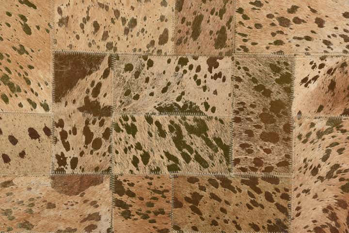 5' 2 x 8' 3 Cowhide Rug