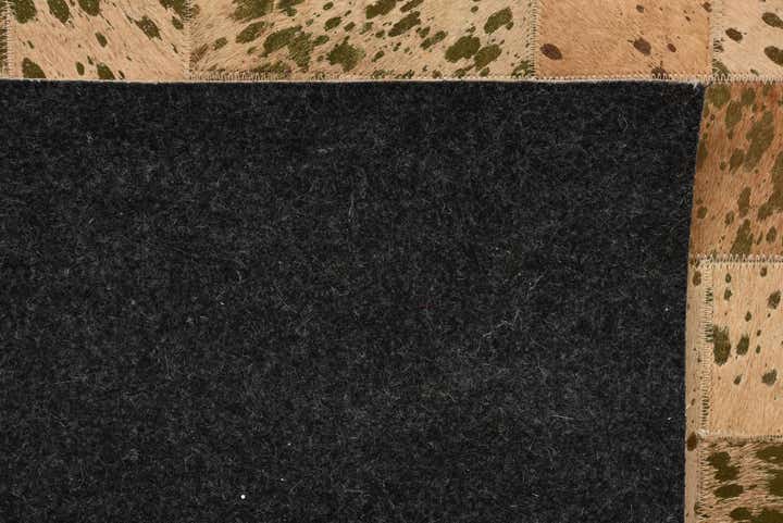 5' 2 x 8' 3 Cowhide Rug
