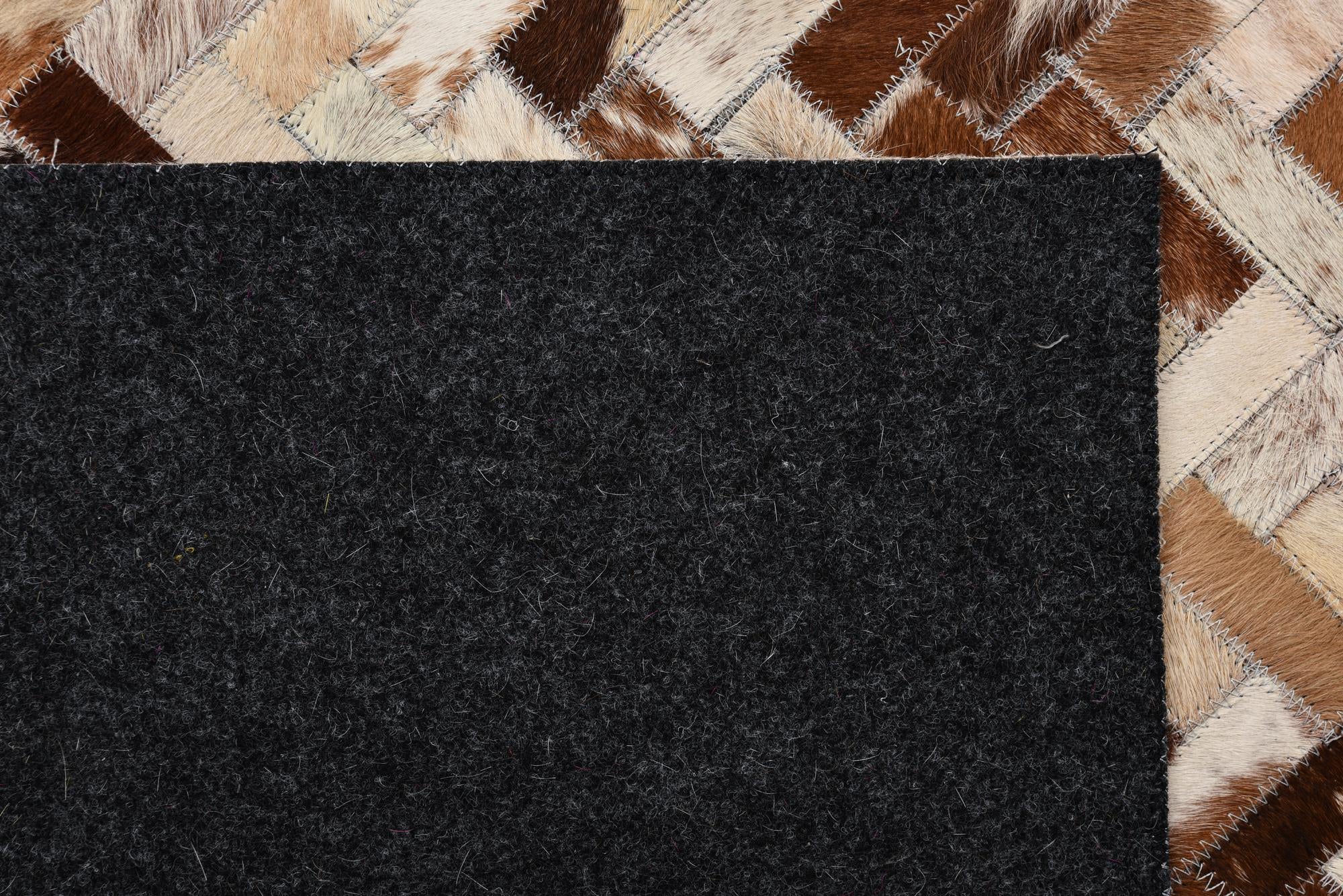 5' 1 x 7' 9 Cowhide Rug
