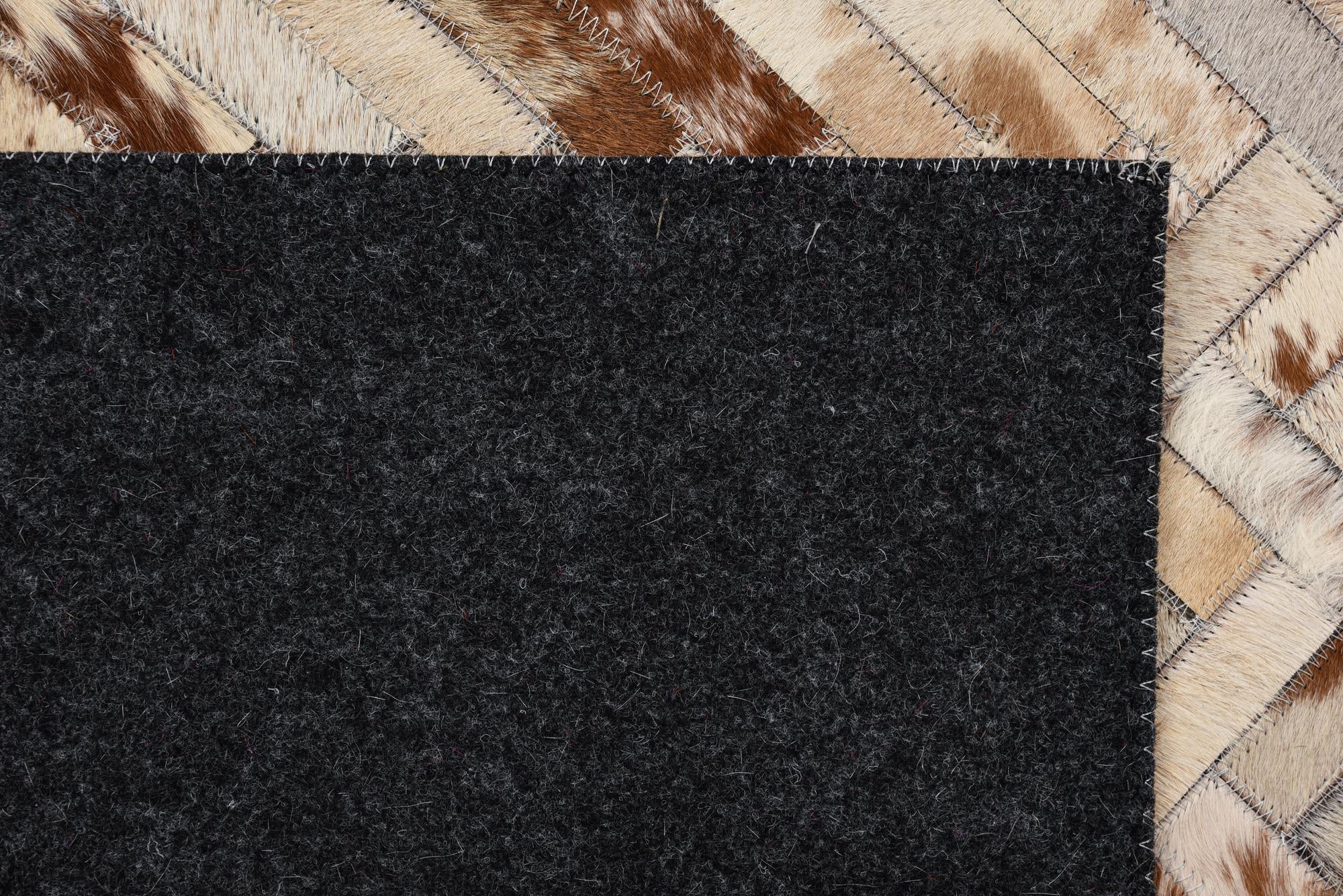5' x 7' 9 Cowhide Rug