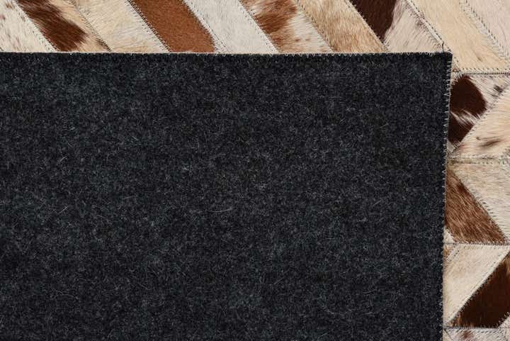 5' 1 x 8' Cowhide Rug