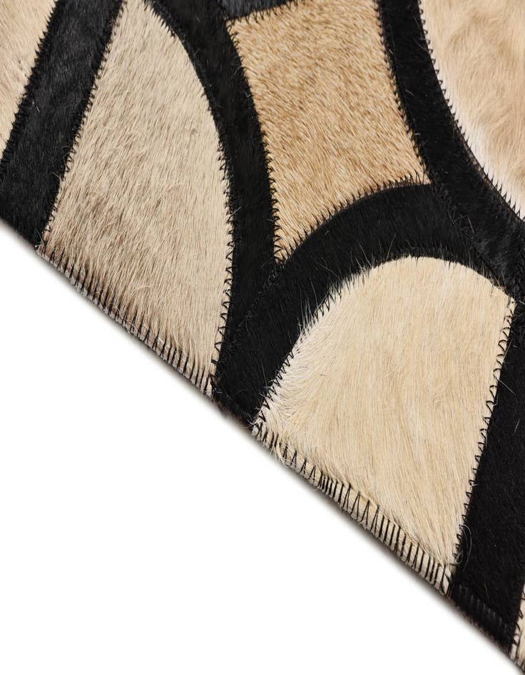 Detail image of 5' x 7' 10 Cowhide Rug