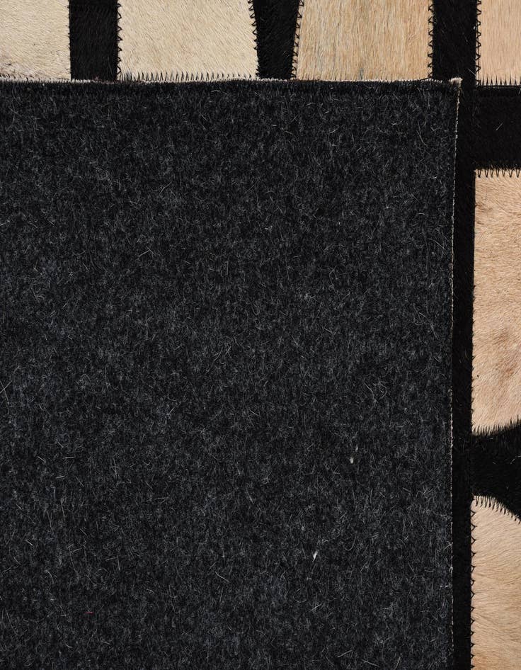 Detail image of 5' x 7' 10 Cowhide Rug