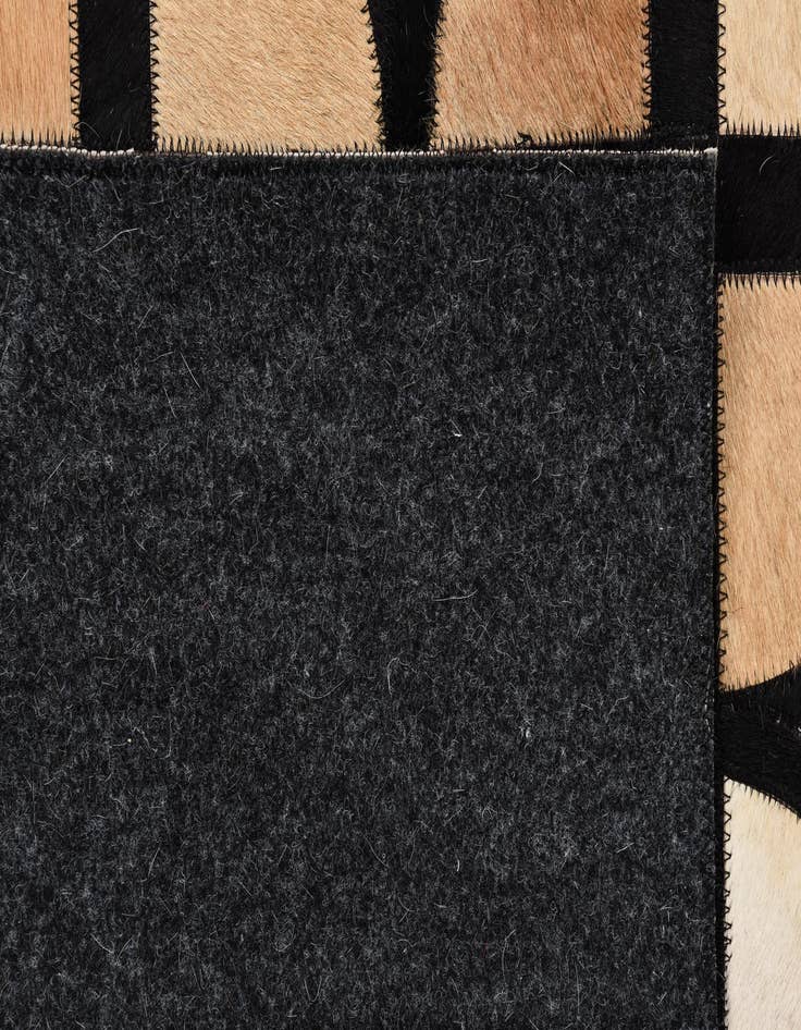 Detail image of 5' x 7' 10 Cowhide Rug