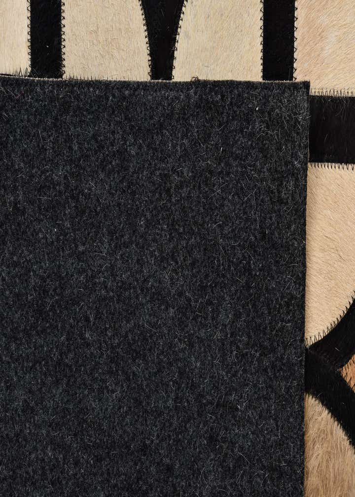 5' 1 x 8' Cowhide Rug