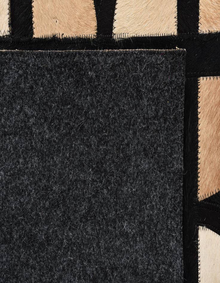 Detail image of 5' x 7' 10 Cowhide Rug