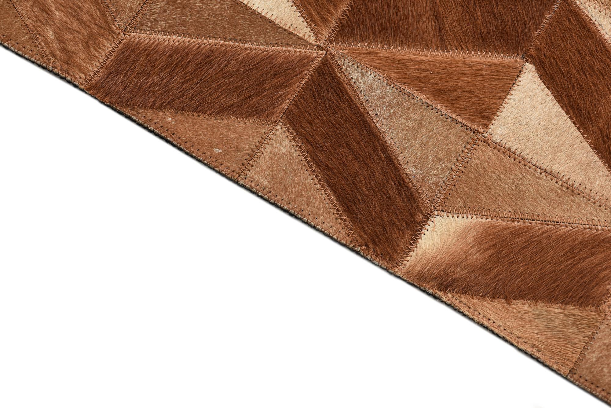 5' 1 x 8' 2 Cowhide Rug