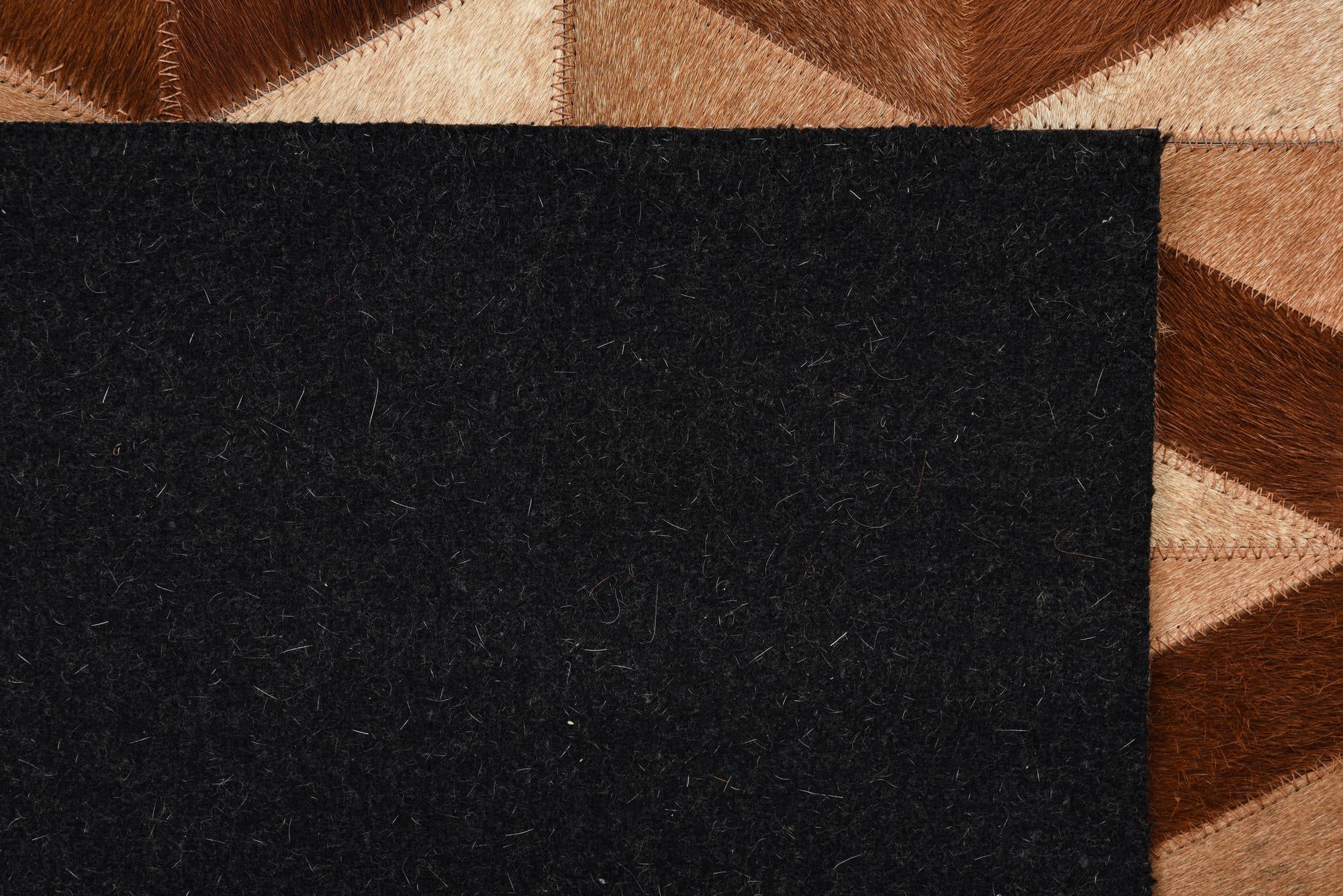 5' 1 x 8' 2 Cowhide Rug