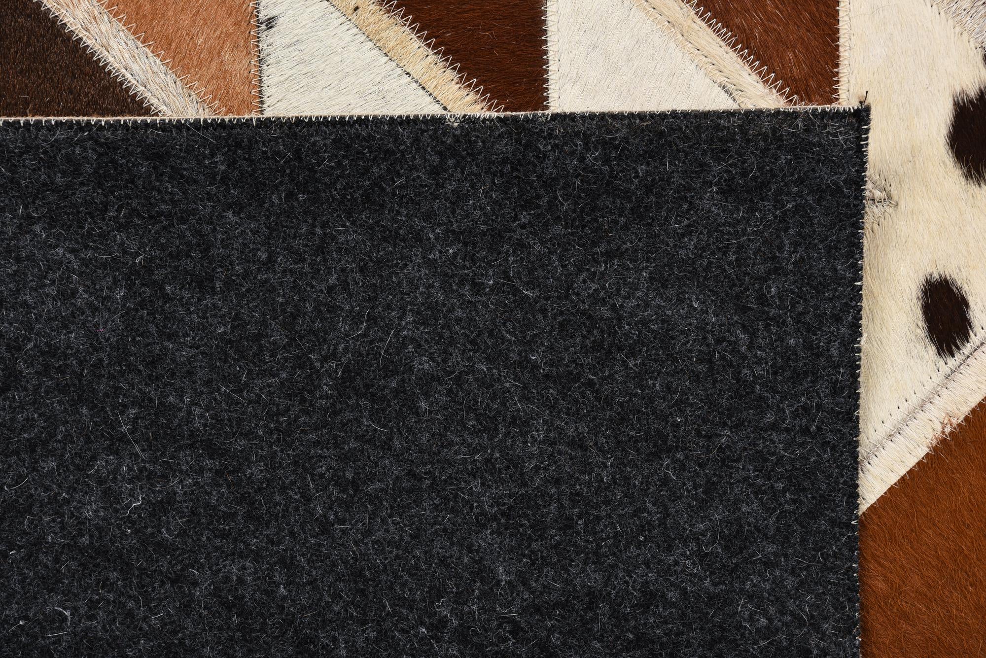 5' 1 x 7' 10 Cowhide Rug