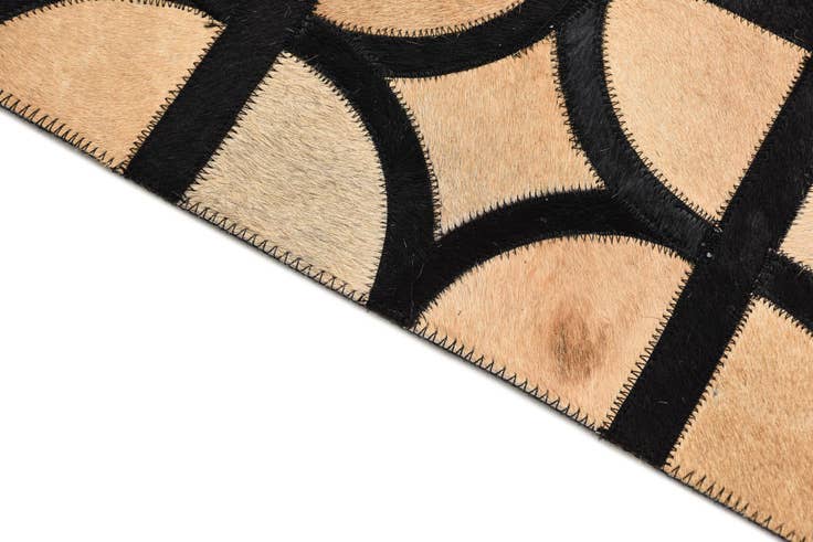 Detail image of 5' x 7' 10 Cowhide Rug