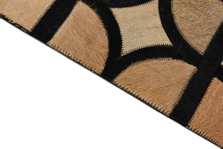 5' x 7' 9 Cowhide Rug
