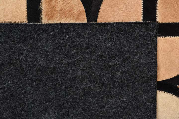 5' x 7' 9 Cowhide Rug