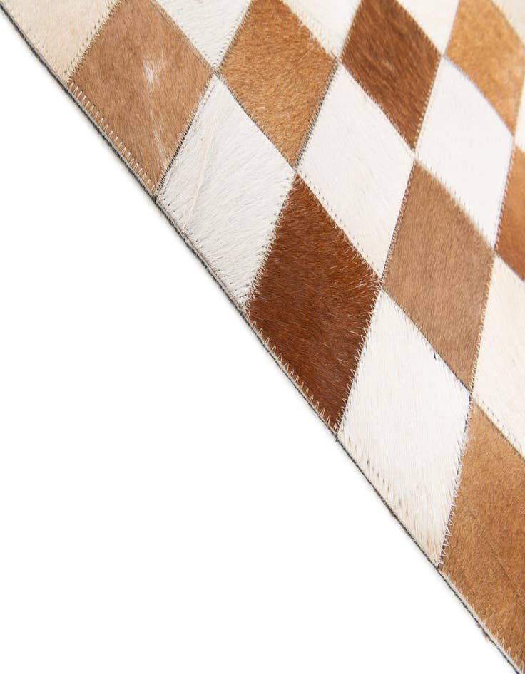 Detail image of 5' x 7' 11 Cowhide Stocks Rug