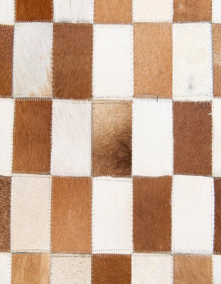 Detail image of 5' x 7' 11 Cowhide Stocks Rug