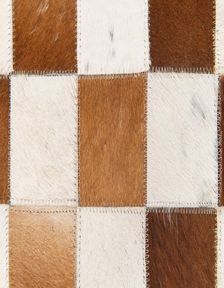 Detail image of 5' x 7' 11 Cowhide Stocks Rug