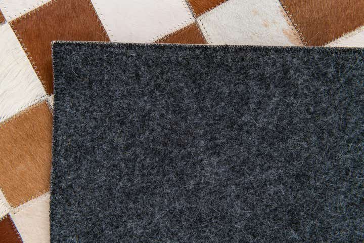 5' x 7' 11 Cowhide Stocks Rug