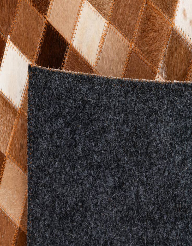 Detail image of 5' 1 x 7' 11 Cowhide Stocks Rug