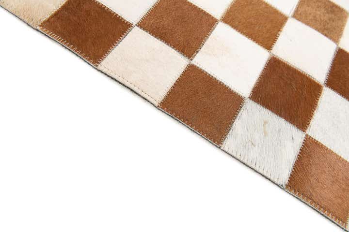 5' x 7' 11 Cowhide Stocks Rug