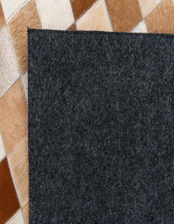 Detail image of 5' x 8' Cowhide Stocks Rug