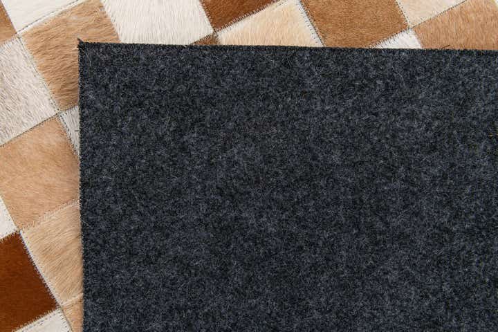 5' x 8' Cowhide Stocks Rug