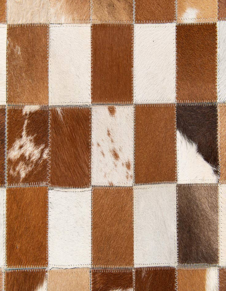 Detail image of 5' x 7' 11 Cowhide Stocks Rug