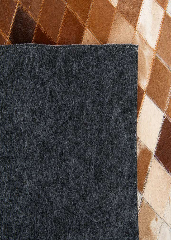 4' 10 x 8' Cowhide Stocks Rug