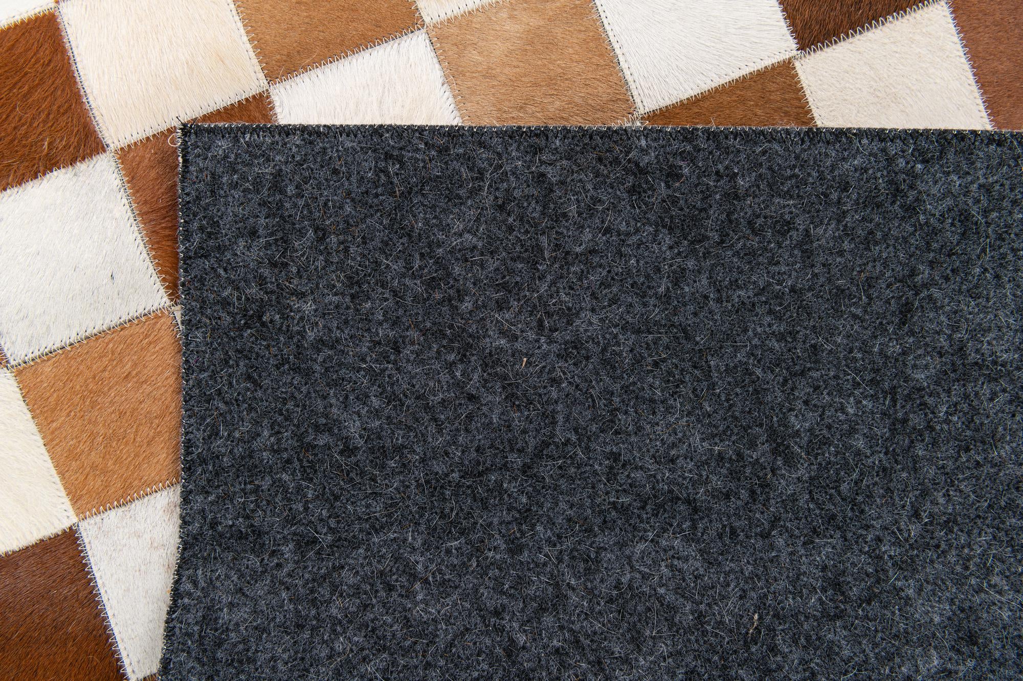 5' x 8' Cowhide Stocks Rug