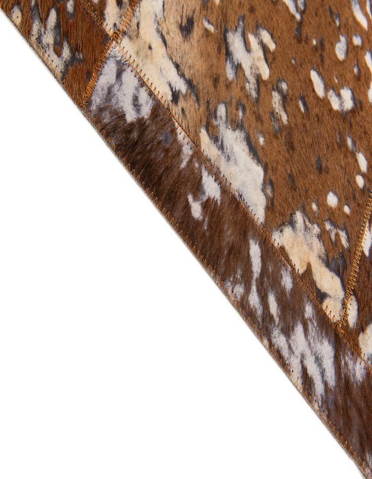 Detail image of 5' 2 x 8' Cowhide Stocks Rug