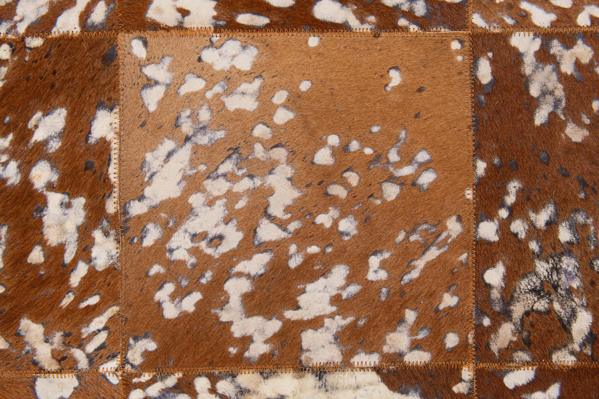 5' 2 x 8' Cowhide Stocks Rug