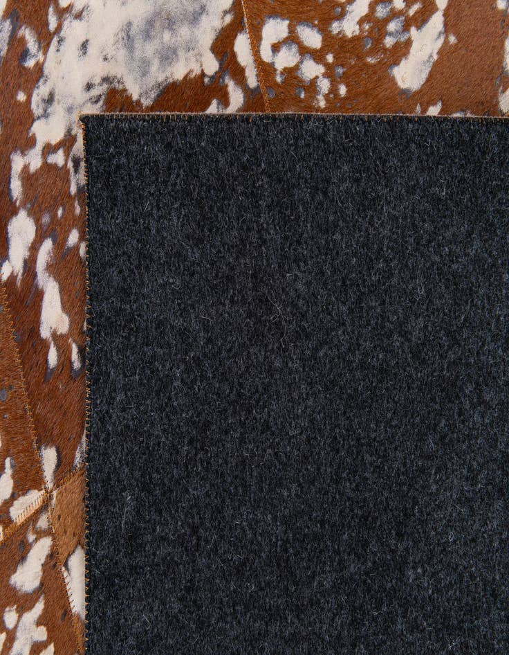 Detail image of 5' 2 x 8' Cowhide Stocks Rug