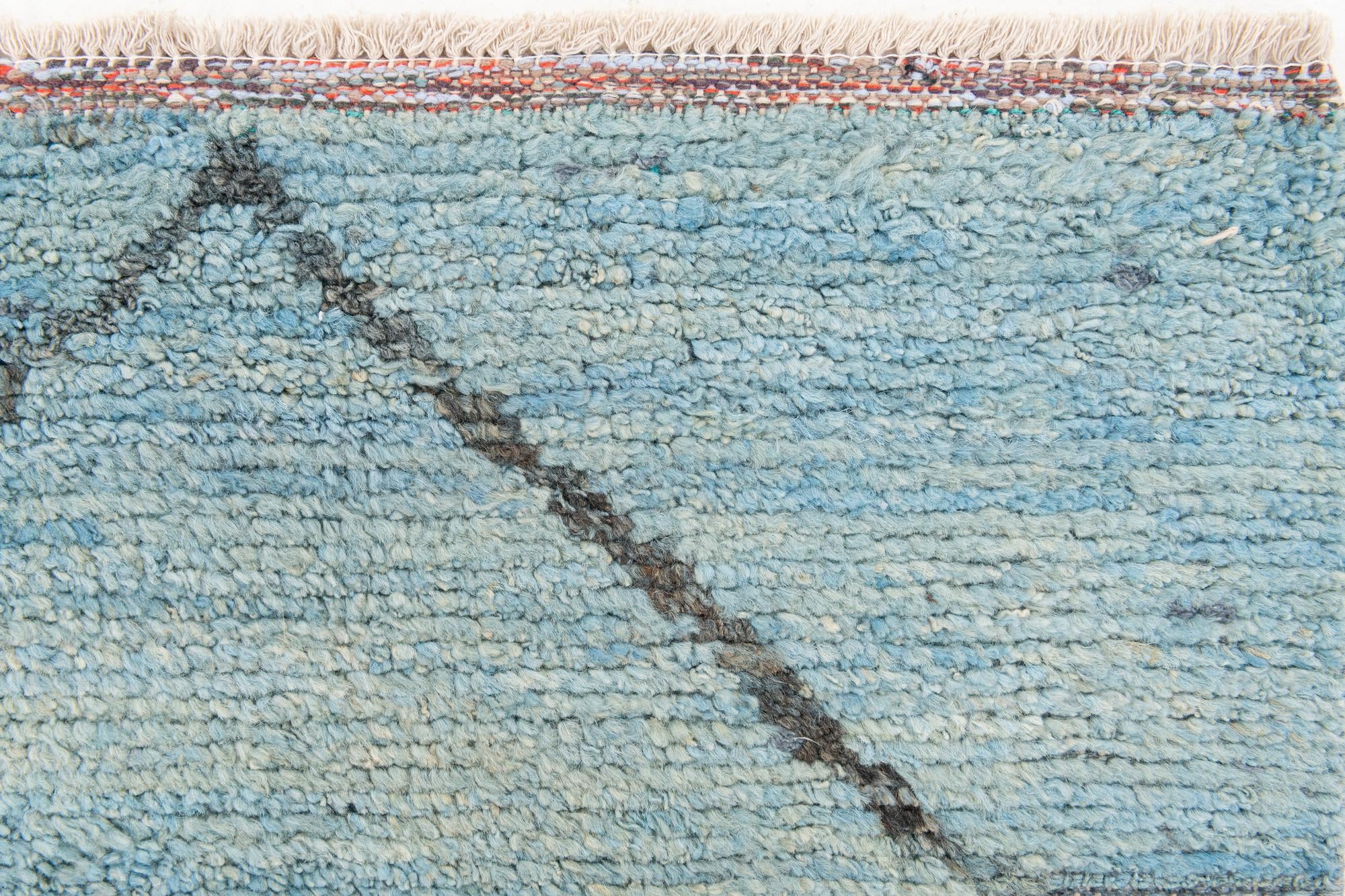 5' 10 x 9' 2 Hand Knotted Moroccan Wool Rug