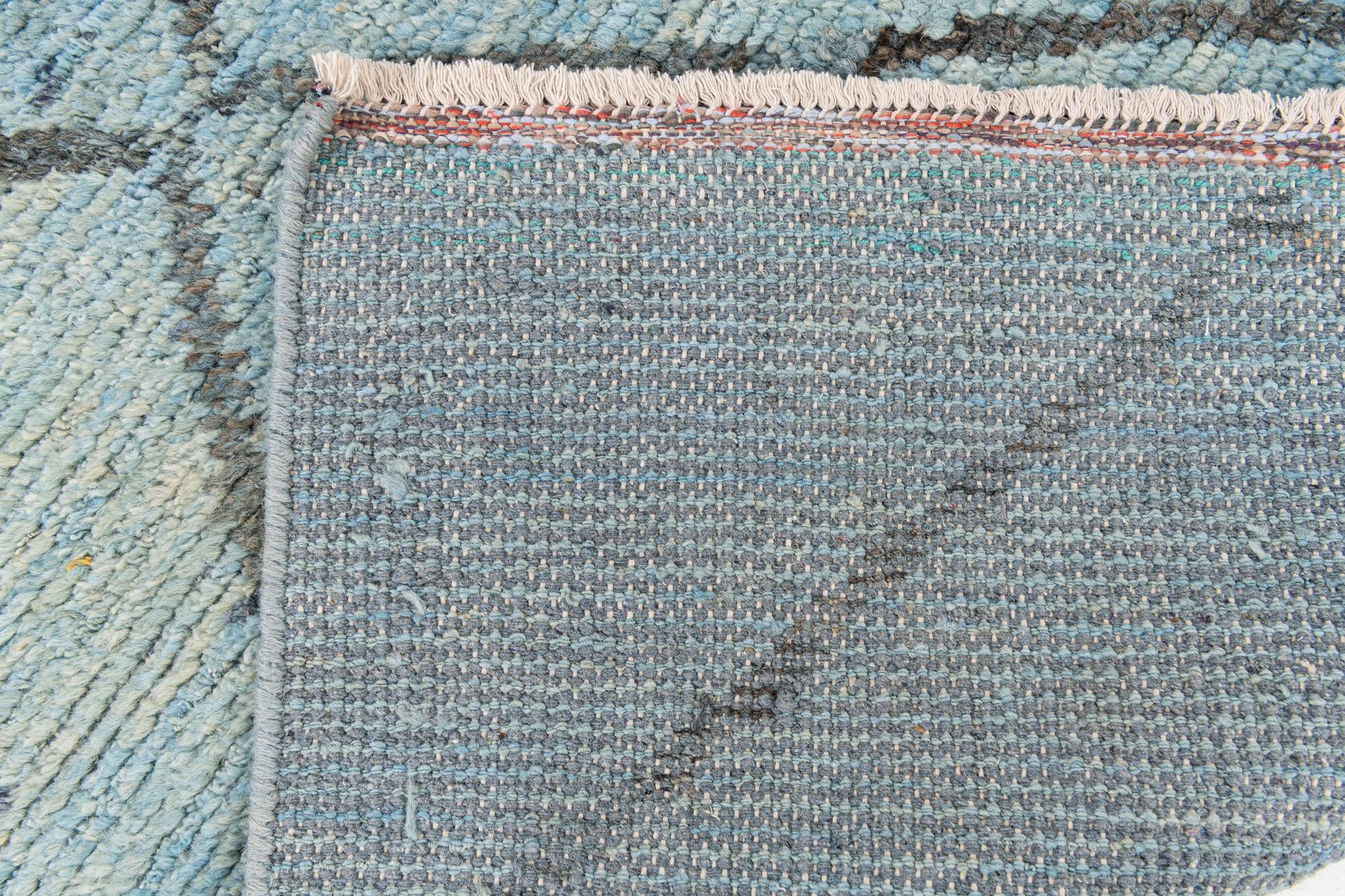 5' 10 x 9' 2 Hand Knotted Moroccan Wool Rug