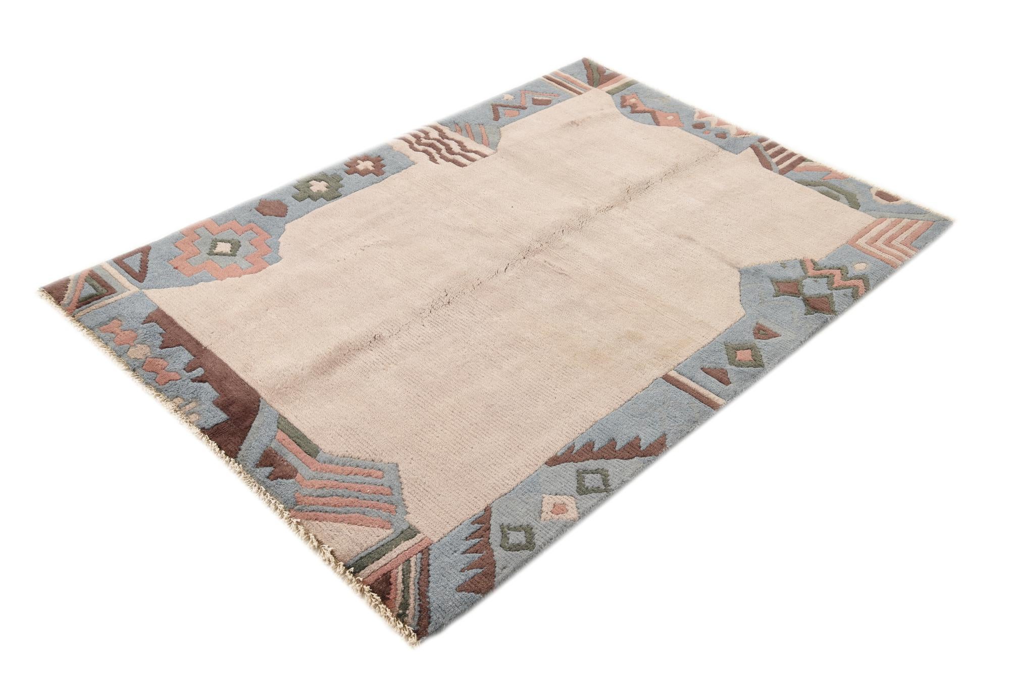 3' 11 x 5' 10 Hand Knotted Nepal Wool Rug