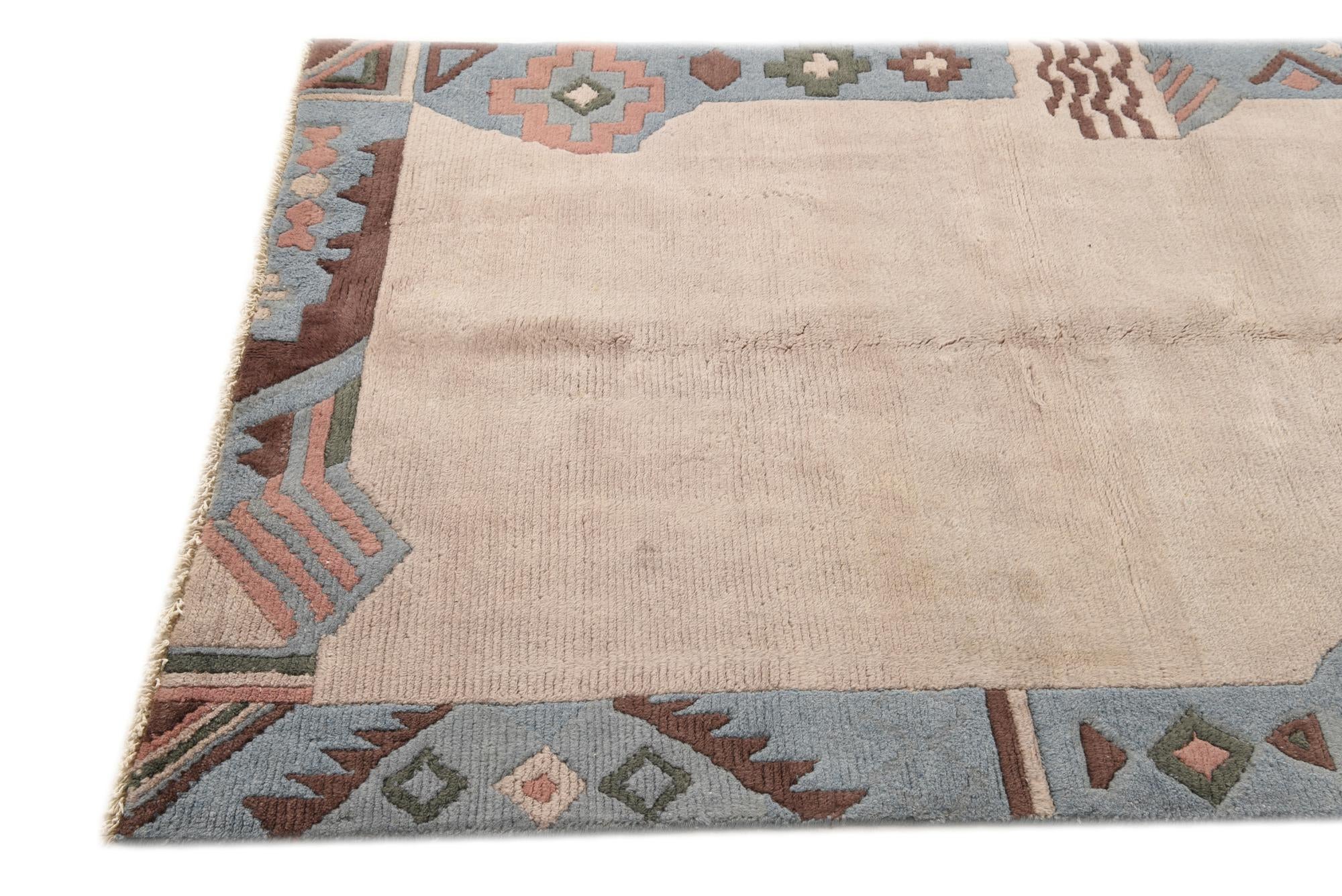 3' 11 x 5' 10 Hand Knotted Nepal Wool Rug
