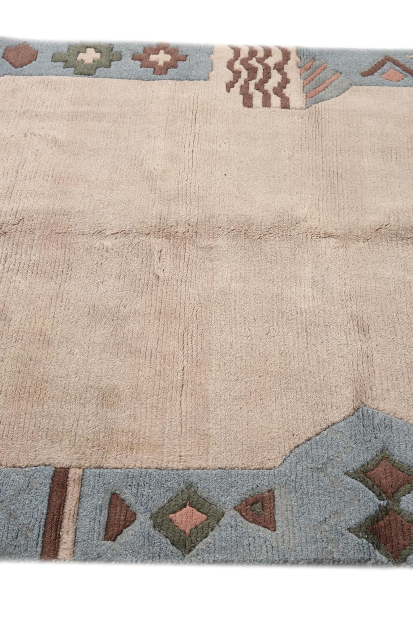 3' 11 x 5' 10 Hand Knotted Nepal Wool Rug