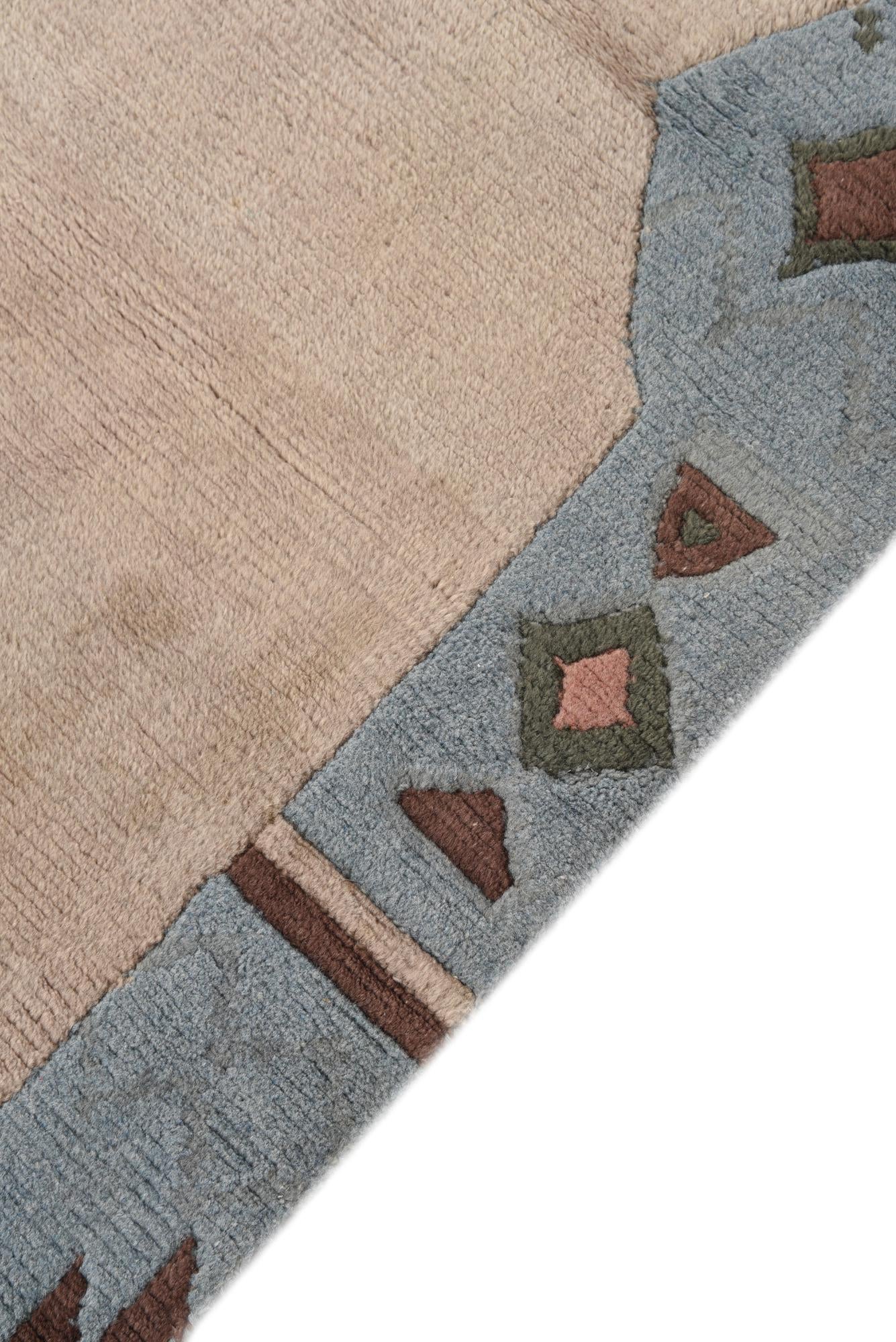 3' 11 x 5' 10 Hand Knotted Nepal Wool Rug