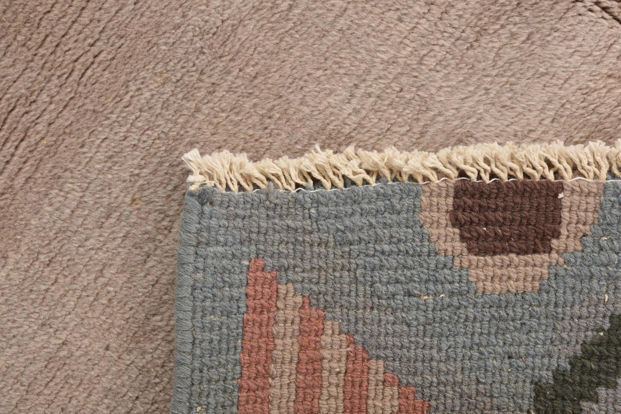 3' 11 x 5' 10 Hand Knotted Nepal Wool Rug