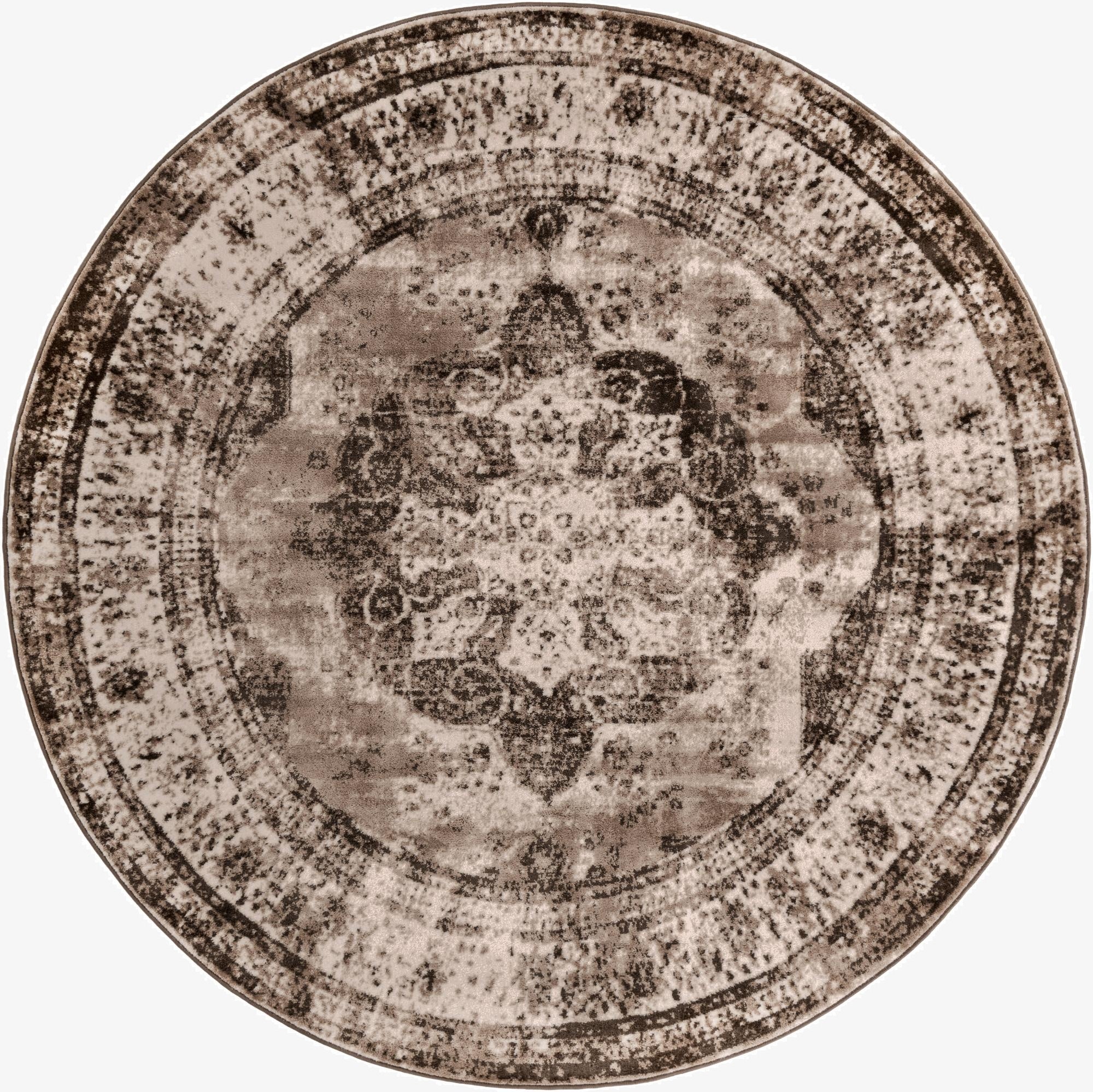 A 7' 10 round Monte Carlo rug in browns and tans with a distressed medallion pattern, ideal for indoor spaces.