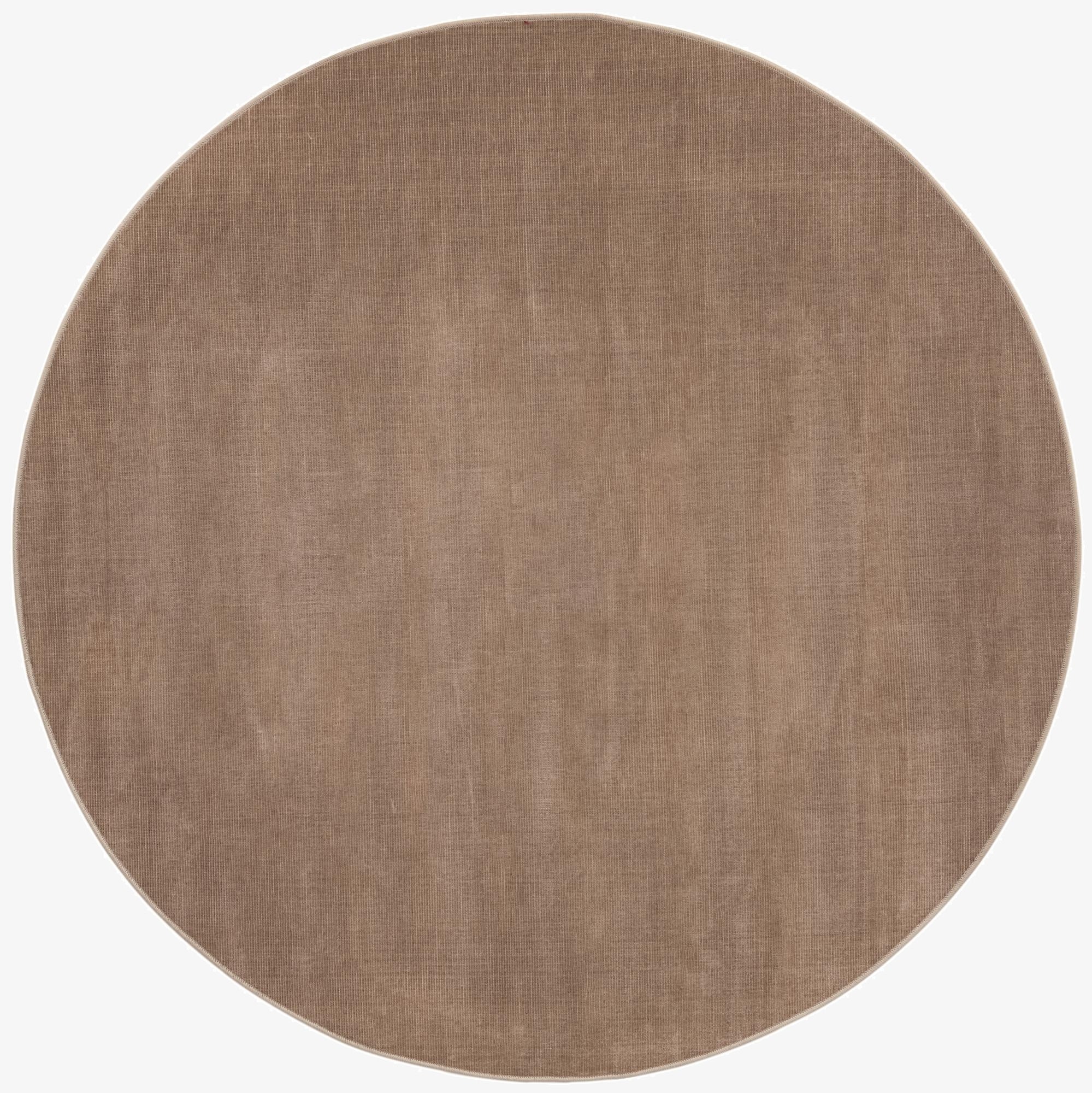 A 5' 0 x 5' 0 round SoHo rug in a solid brown/tan color, made from polypropylene, with a flat pile.