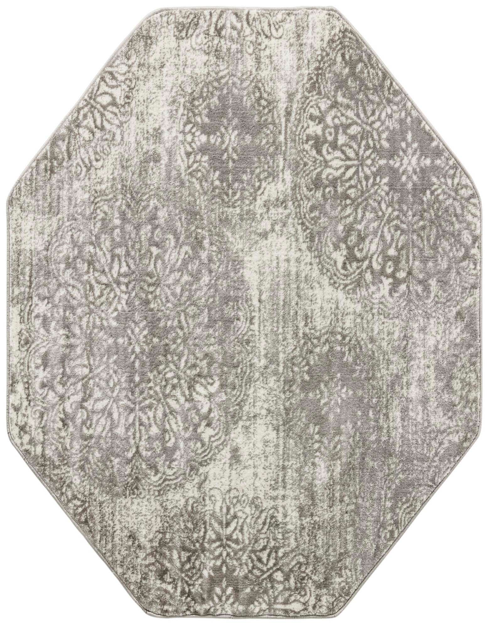 A 5' 3 x 5' 3 octagon rug with a distressed gray and silver floral medallion pattern, suitable for various indoor spaces.