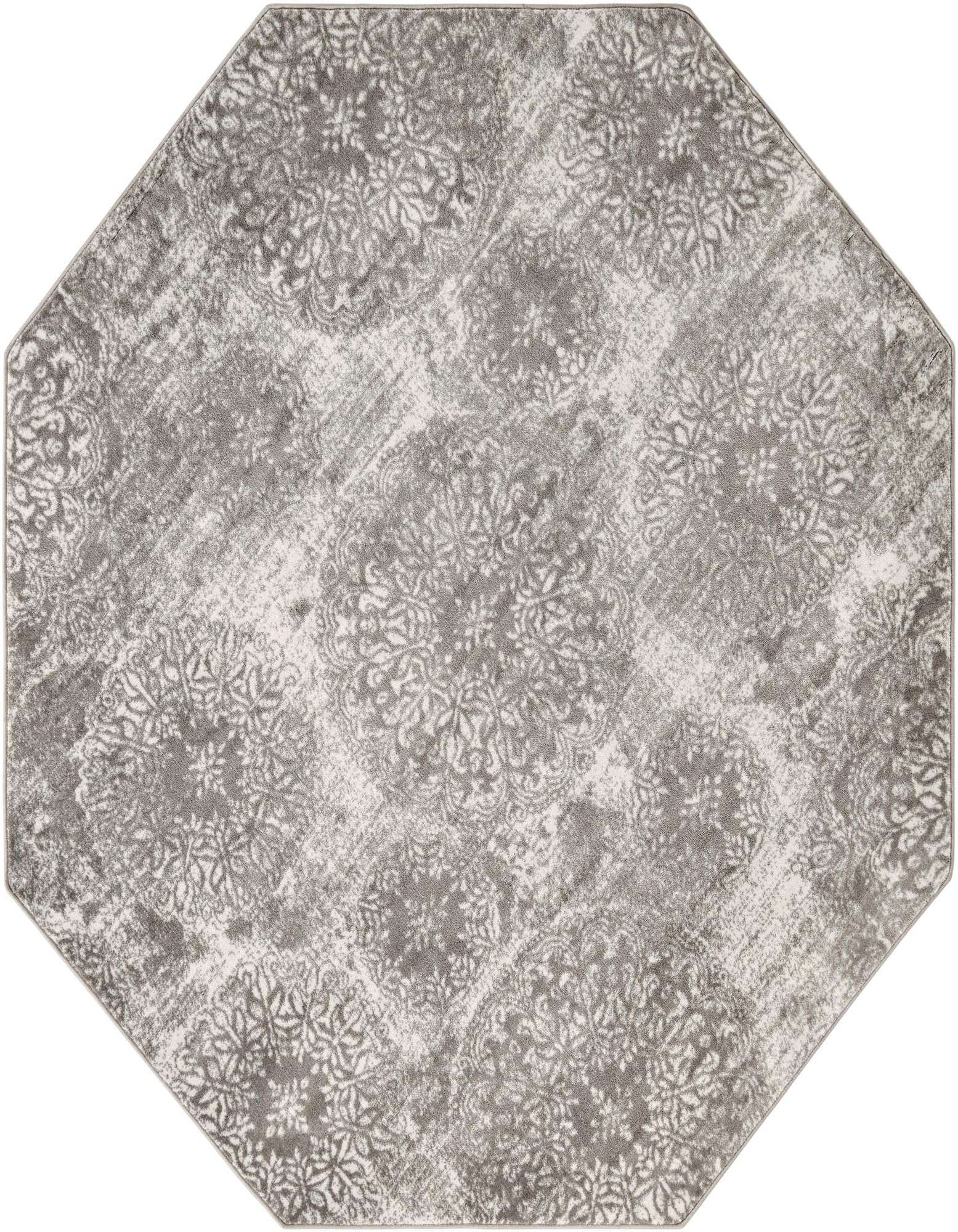 An octagon-shaped gray and silver rug with a distressed traditional floral pattern, ideal for an indoor living space.