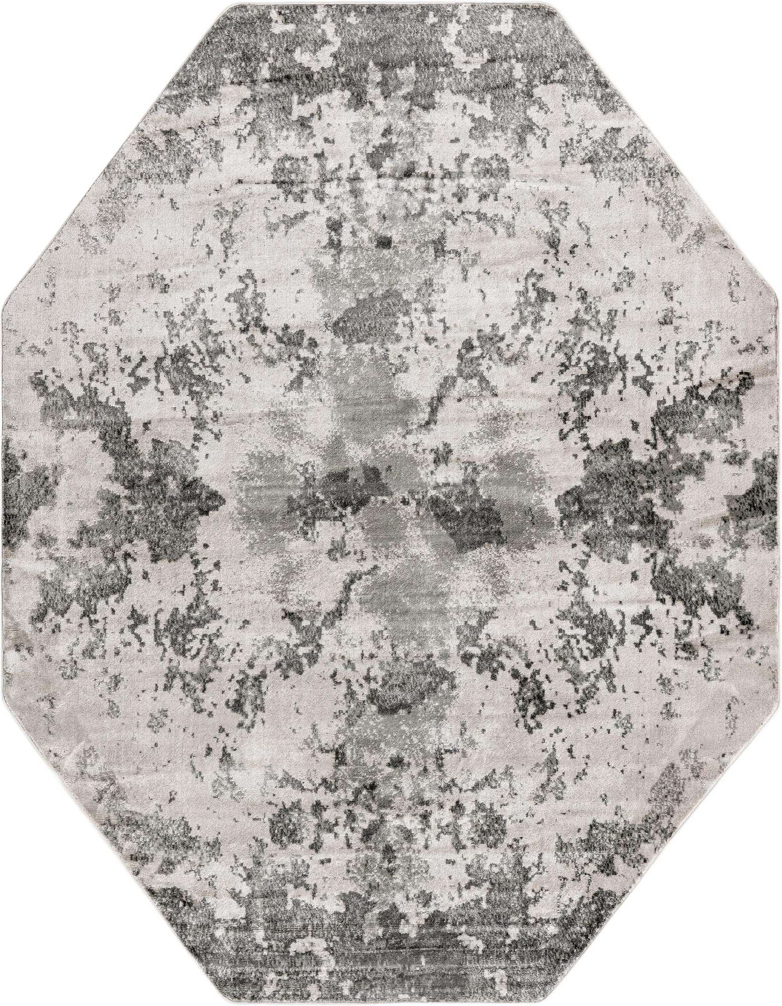 An 8' 0 x 8' 0 octagon gray area rug with an abstract, urban-industrial pattern in varying shades of gray and silver.