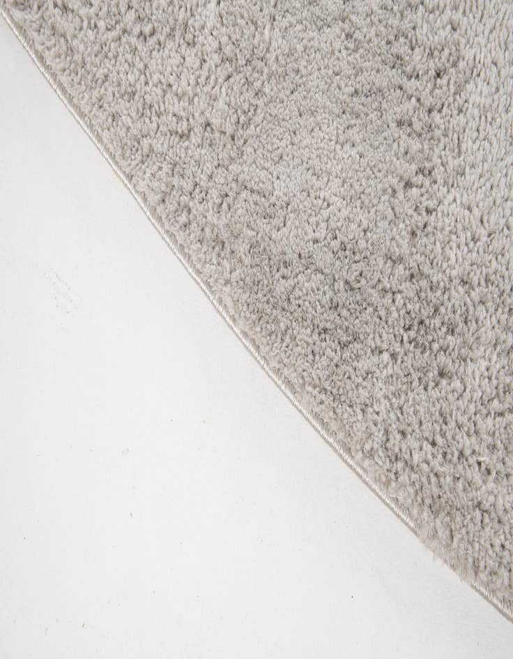 Detail image of 5' 2 x 7' 8 Solid Shag Oval Rug