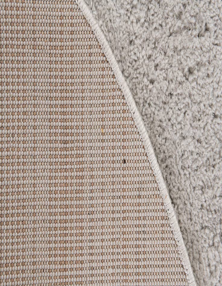 Detail image of 5' 2 x 7' 8 Solid Shag Oval Rug