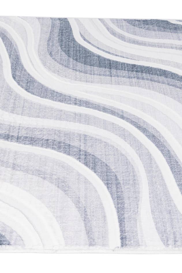 Detail image of 5' 1 x 6' 11 Carved Solid Rabbit Rug