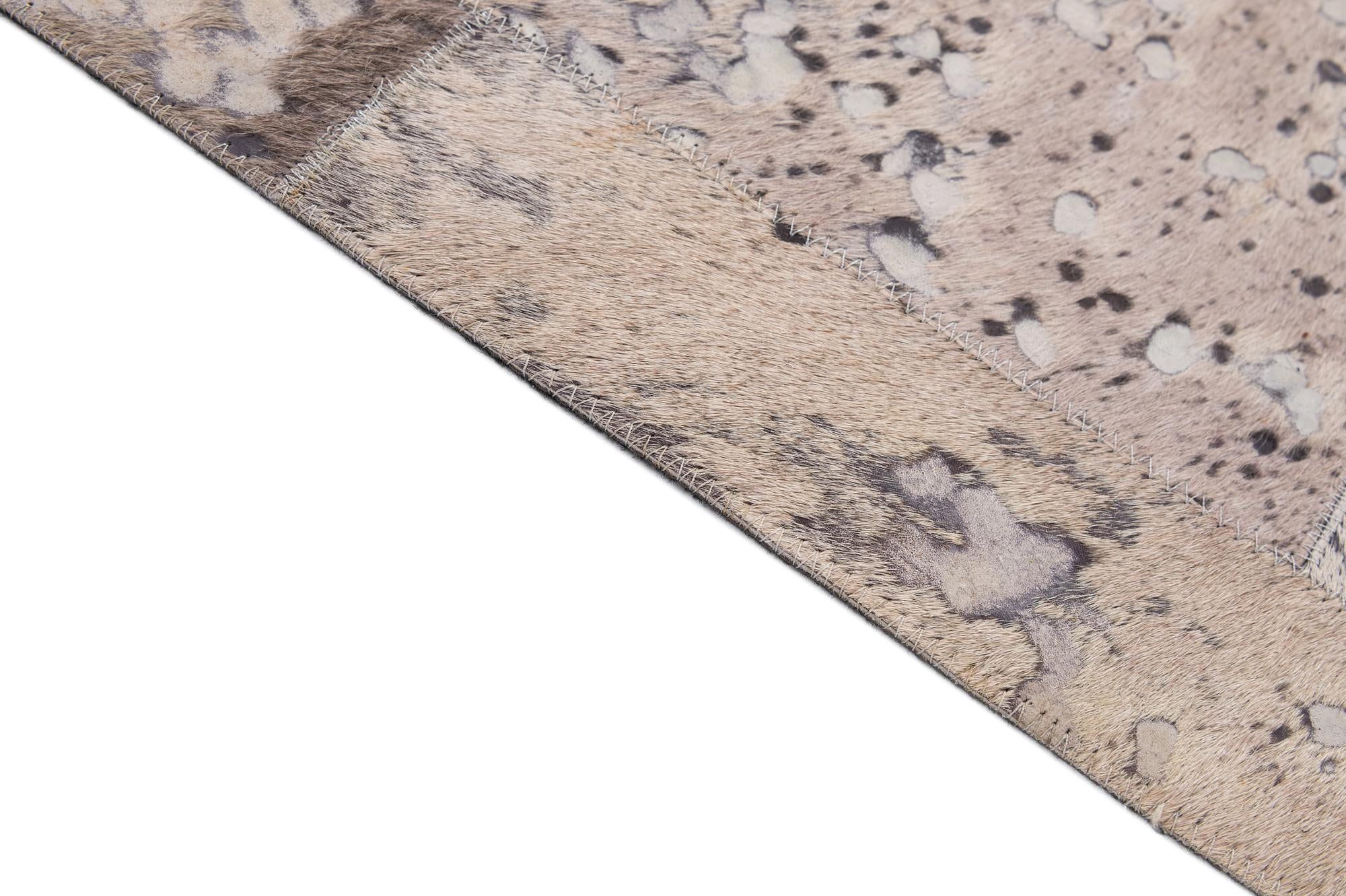 5' 4 x 8' 2 Cowhide - Patchwork Rug