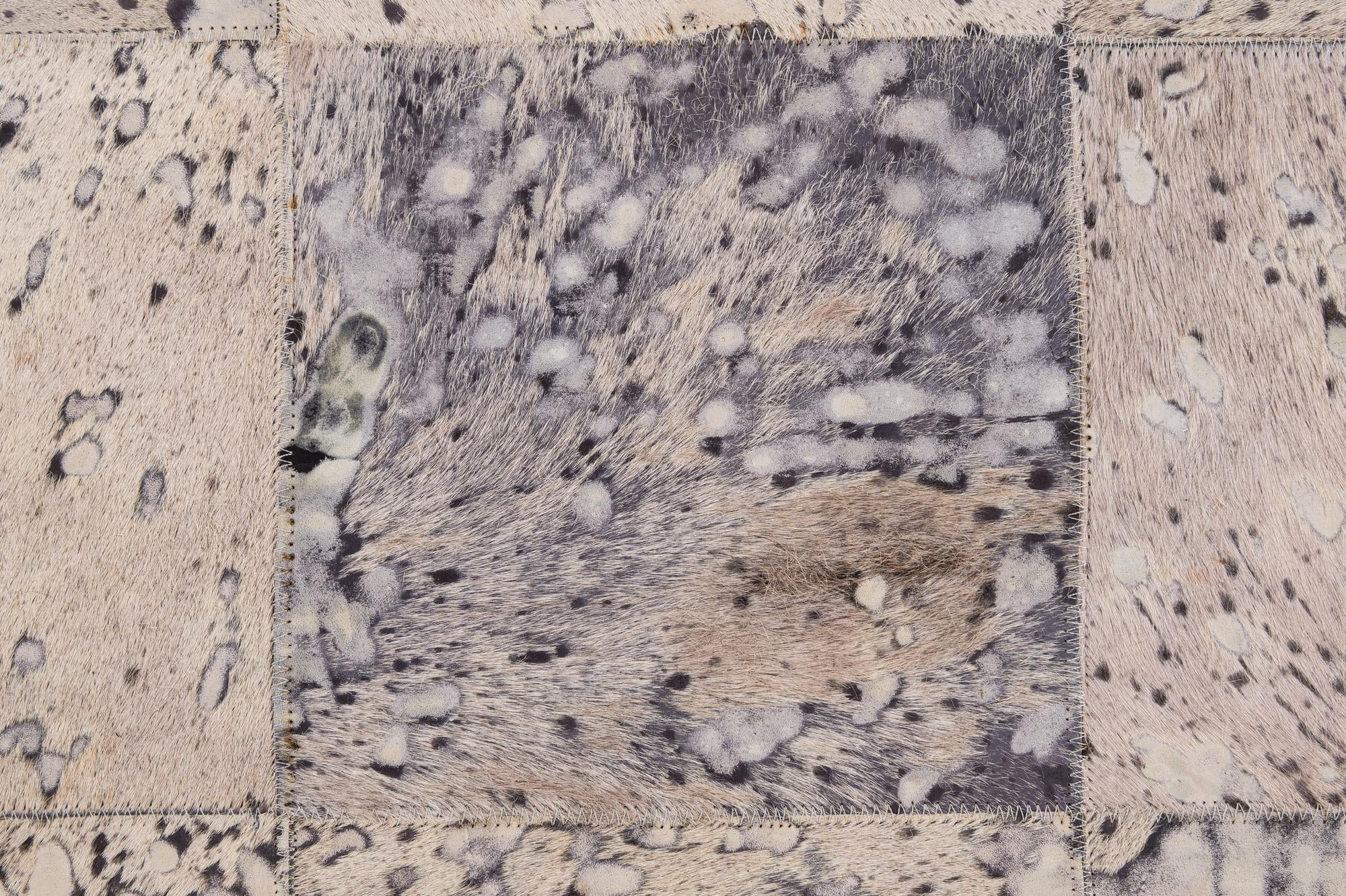 5' 4 x 8' 2 Cowhide - Patchwork Rug